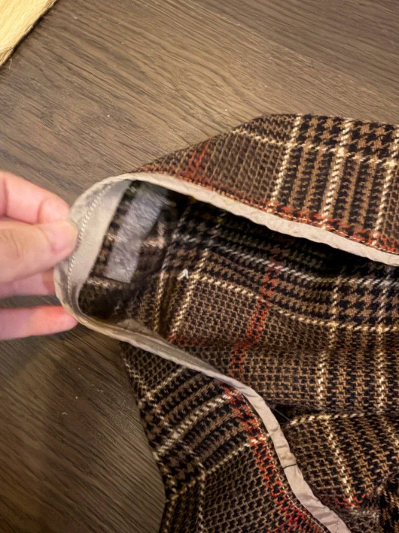 brown plaid midi skirt (Category: Skirts) located in Manila. Submitted by laurloopsy (Listing ID 1450964568, Image 3). Description: - classic brown plaid midi skirt - has a zipper closure at the side - tweed fabric kind of (?) - very cute! issues (slides 3 and 4): - some of the lining fell off - can be fixed by sewing.