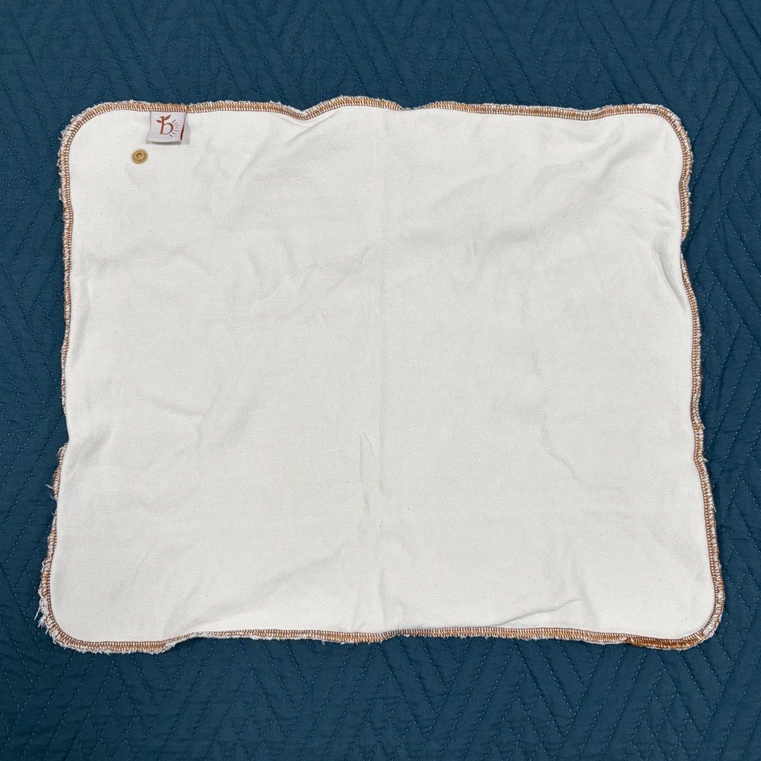 Bumboss cloth diaper soaker/insert (Category: Diapers & Baby Wipes) located in Quezon City. Submitted by abigail.tiu (Listing ID 1451048234, Image 3). Description: Quadfold hemp-bamboo cloth diaper soaker/insert from Bumboss. Like new condition. No stains or damages. Used less than 5x. Original price: ₱341.