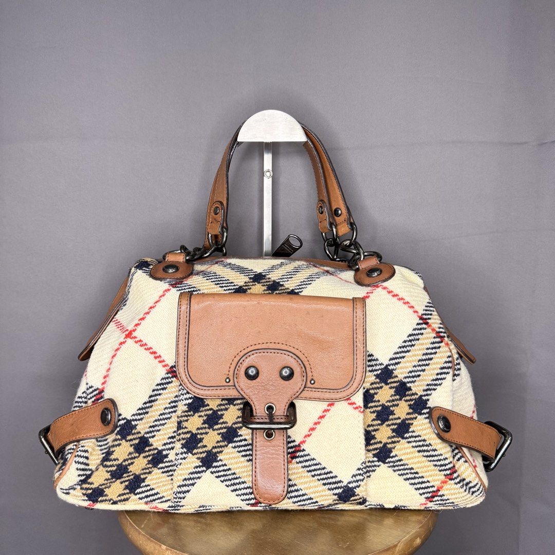 Burberry Blue Label Vintage Bowling Bag (Category: Luxury Bags & Wallets) located in Manila. Submitted by saintjohnn (Listing ID 1451130907, Image 2). Description: Burberry Blue Label Vintage Bowling Bag Width: 15" Length: 10" Depth: 6" Excellent Condition Sign of Usage ₱10,000.