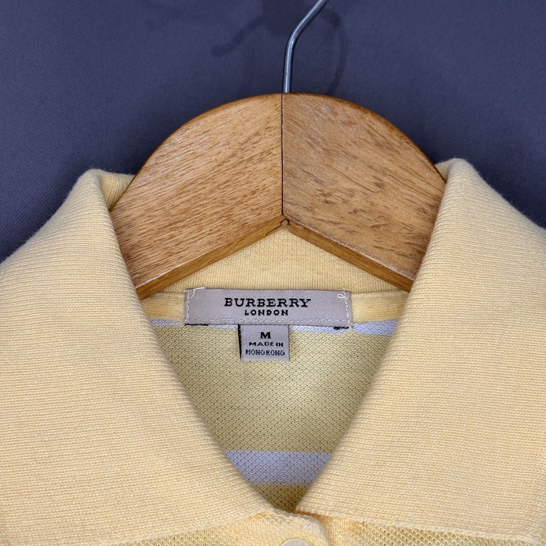 Burberry Striped Polo Shirt (Category: Luxury Apparel) located in Manila. Submitted by saintjohnn (Listing ID 1451130673, Image 3). Description: Burberry Striped Polo Shirt Width: 15" Length: 21" Size: M Excellent Condition No Issue ₱500.