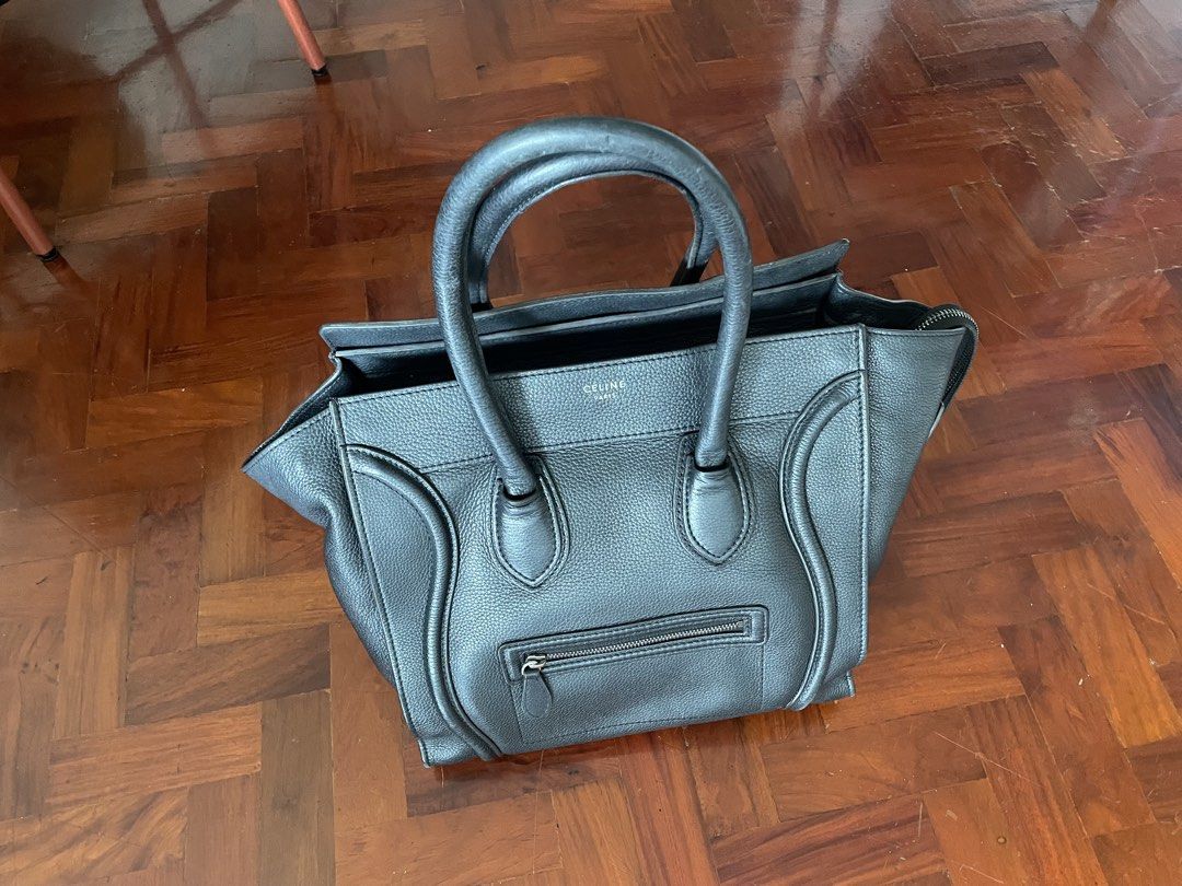Celine Luggage Tote Bag Black (Category: Luxury Bags & Wallets) located in Makati City. Submitted by goodjujugoods (Listing ID 1450971068, Image 1). Description: black grainy leather signature structured wings and a front zipper pocket comes with original celine dust bag .