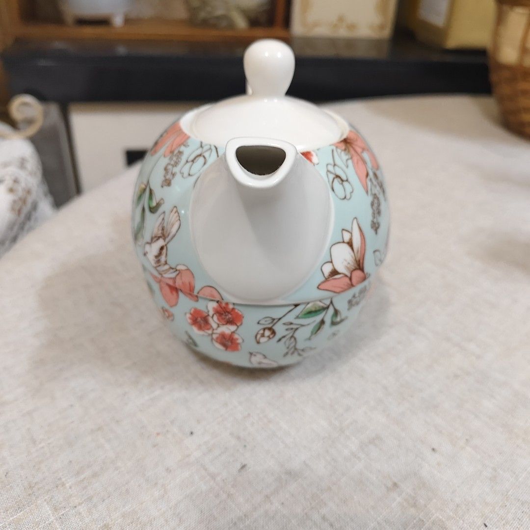 ceramic tea-for-one set features a light blue base decorated with delicate pink and white floral and bird illustrations (Category: Coffee & Tea Tableware) located in Shah Alam. Submitted by fishnchips06 (Listing ID 1451037931, Image 3). Description: .