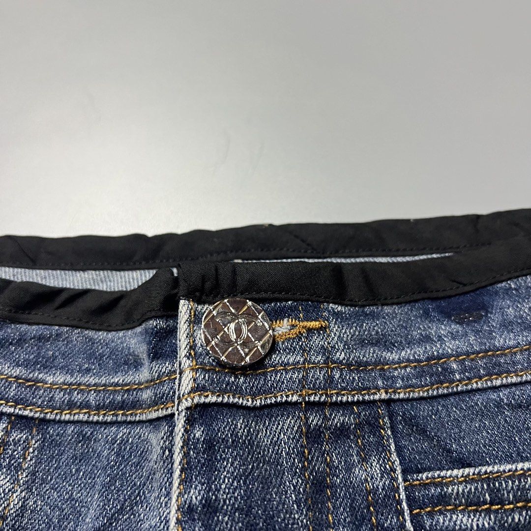 Chanel Blue Denim Jeans with CC Logo (Category: Jeans) located in Bago City. Submitted by g___shop (Listing ID 1451034971, Image 3). Description: - Iconic Chanel blue denim jeans - Signature CC logo embroidered on back pockets - Classic button and zip fly closure - Trendy flare leg silhouette - Stylish slit detail at the hem - Authentic Made in Italy craftsmanship - Elevate your casual wardrobe with a touch of luxury.