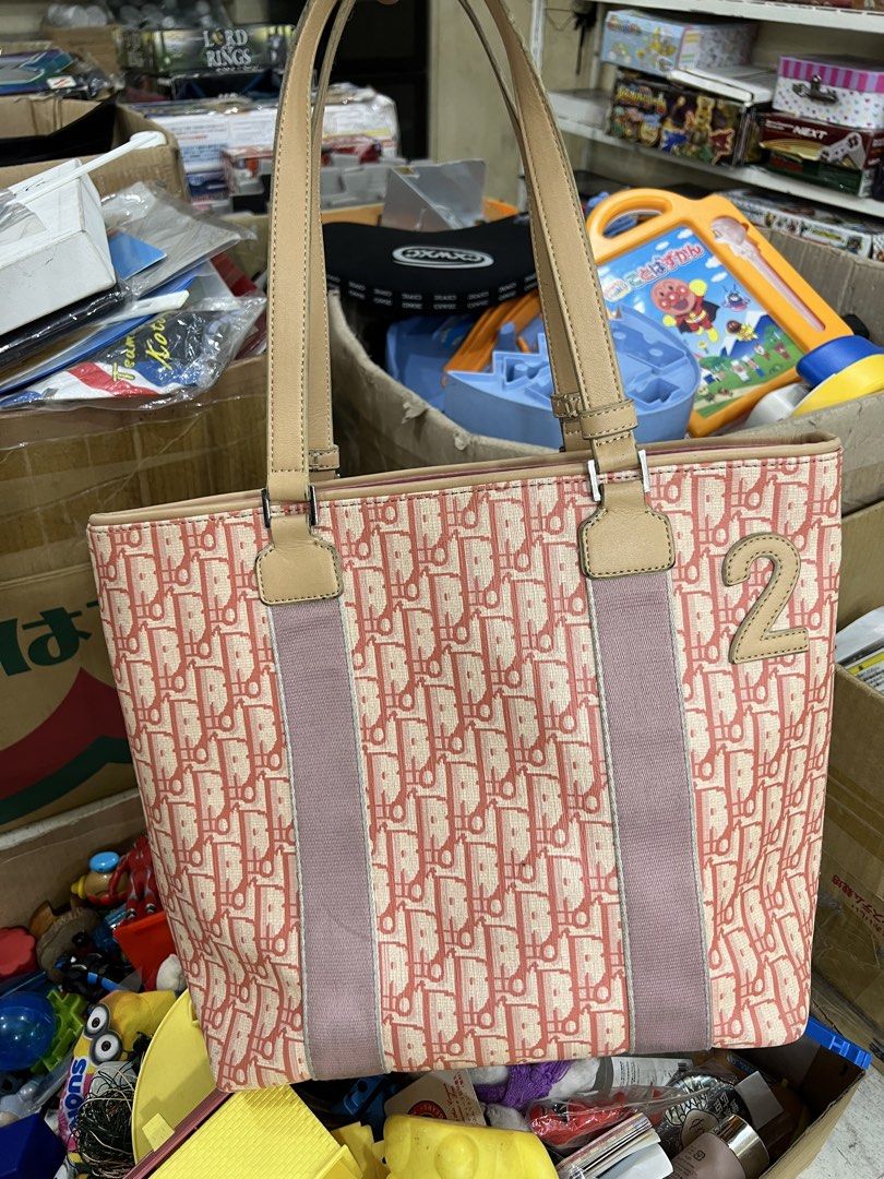 Christian Dior Trotter "No. 2" canvas (Category: Luxury Bags & Wallets) located in Bacolod City. Submitted by novymae23 (Listing ID 1450968697, Image 1). Description: Christian Dior Trotter "No. 2" canvas tote size medium excellent condition.