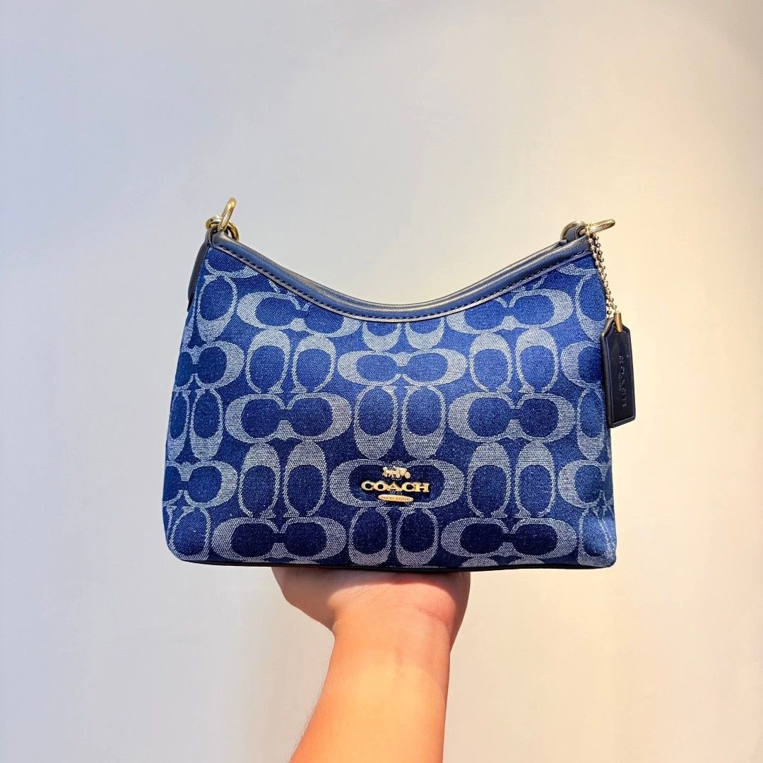 Coach Denim Signature Monogram Shoulder Bag (Category: Luxury Bags & Wallets) located in Tarlac. Submitted by jelly_thrift (Listing ID 1451115581, Image 1). Description: ukay, goods pa siya, no flaws or issue.