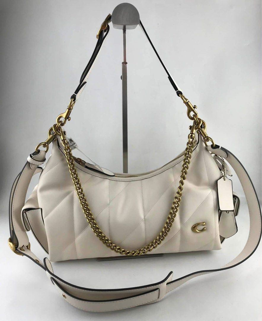 Coach Pocket Juliet Shoulder Bag 30 (Category: Shoulder Bags) located in Marikina City. Submitted by smthxtra (Listing ID 1451093774, Image 2). Description: Inside snap pocket zip-top closure outside turnlock pockets detachable handle with 12” drop detachable chain strap with 12” drop detachable long strap with 21 1/2” drop for shoulder or crossbody wear 12” (L) x 9” (H) x 5” (W) With tag, care card, dust bag, and paper bag included.