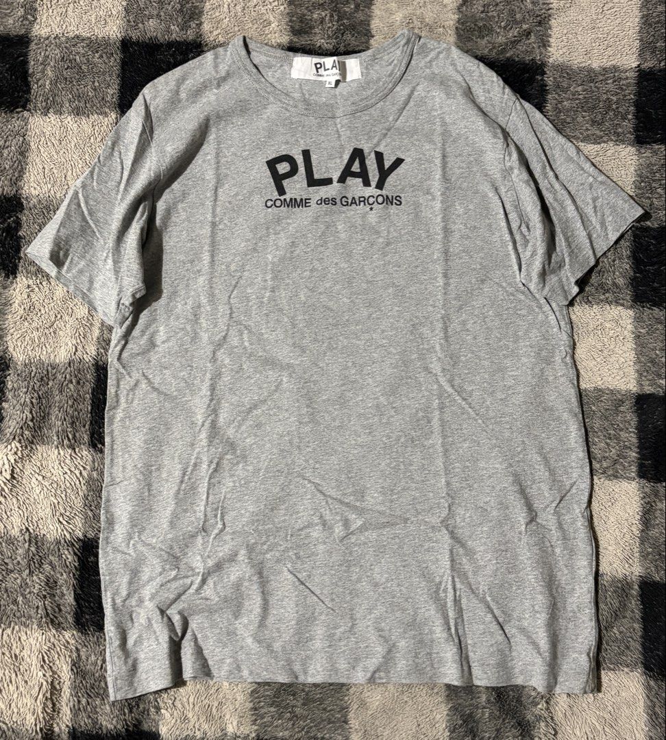 Comme des garcons play shirt (Category: Tshirts & Polo Shirts ) located in Iloilo. Submitted by randomstash (Listing ID 1451071284, Image 1). Description: Comme des garcons play shirt Size XL on tag fits L 21/29 Excellent condition minimal stains At the back unnotieceable when worn 449 + SF.