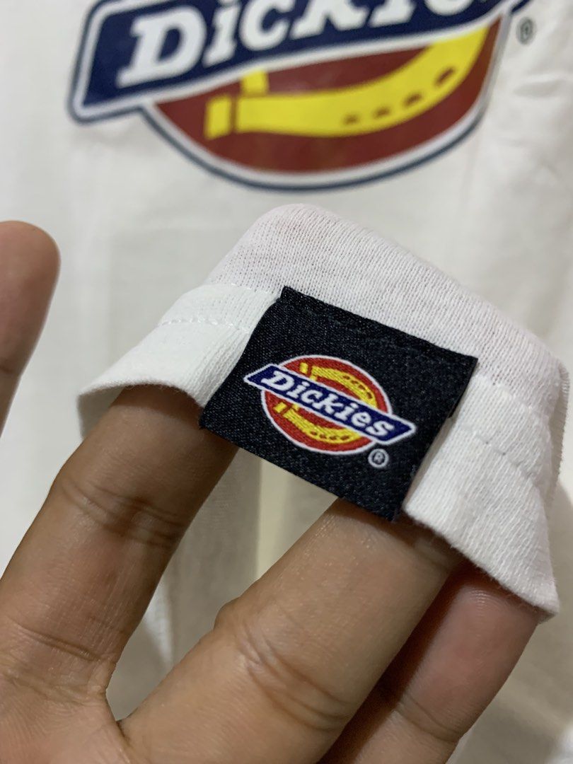Dickies White T-Shirt Size M (Category: Tshirts & Polo Shirts ) located in Davao. Submitted by skanaker (Listing ID 1451078389, Image 3). Description: - Classic white Dickies t-shirt - Features iconic Dickies logo graphic on the front - Made from comfortable 100% cotton - Tagged as size M - Ideal for everyday casual outfits - 22x31.5 dimes - Washable stain in back.