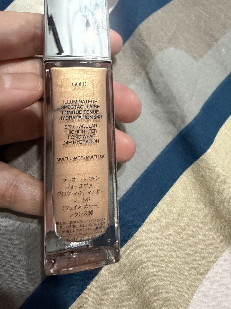 Dior Gold Illuminator / Liquid Highlighter (Category: Makeup) located in Quezon City. Submitted by glitchandglamor (Listing ID 1451093269, Image 2). Description: •RFS: downsizing collection, opened in 10/2024, buy at your own risk, still smells like Dior’s signature elegant, powdery, and floral scent for the makeup • 80% product left.