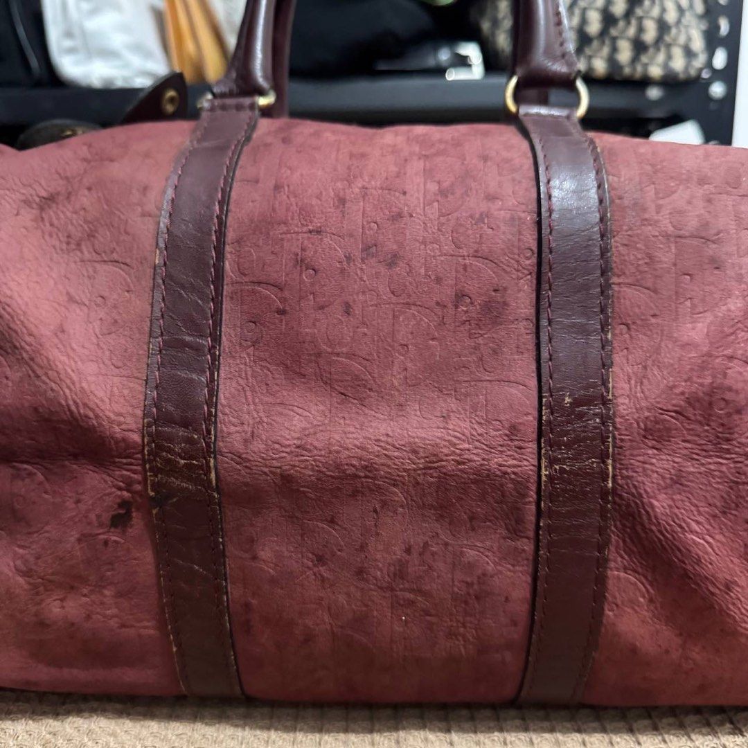 Dior Red Oblique Canvas Duffle Bag - Medium (Category: Luxury Bags & Wallets) located in Angeles City. Submitted by Miss_No_Limits_Ph (Listing ID 1450957964, Image 2). Description: Dior Red Oblique Canvas Duffle Bag - Medium Condition & Flaws: (See Detailed Pictures Attached) Made in France 📐 Measurements in CM Height: 20 cm Width: 30 cm Depth: 16 cm Drop: 12 cm 📎 TAKE NOTE : • Please note that this is a used / thrifted piece, and minor imperfe