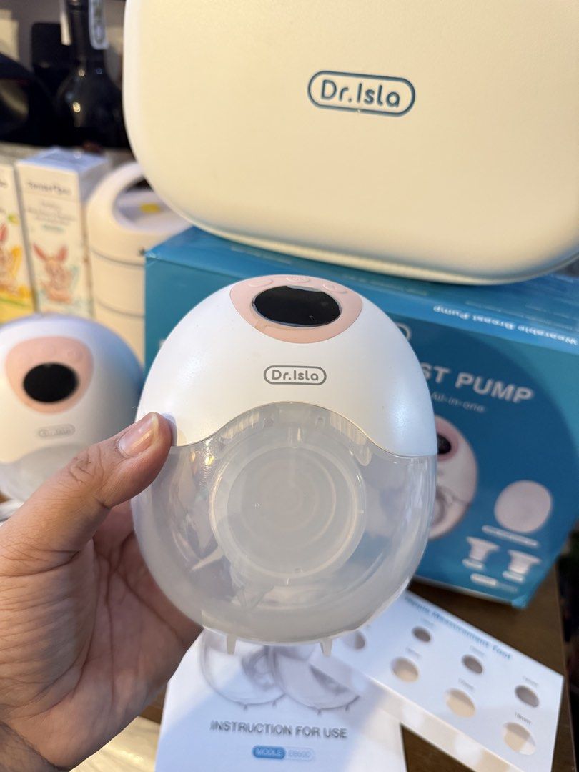 dr.isla Wearable Smart Fully Automatic Breast Pump (Category: Breastfeeding & Bottle Feeding) located in Taguig. Submitted by jaja.17 (Listing ID 1450995021, Image 3). Description: - Dr. Isla Wearable Breast Pump Set (Sobrang ganda ng suction neto, used only for a few times humina breast milk ko kaya need na ibenta, need funds) - Hands-free design for ultimate convenience - Includes two breast pumps - Comes with charging cable and essential acces