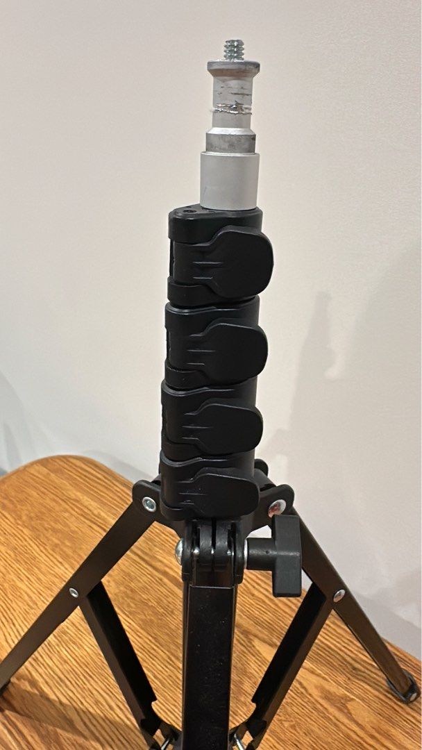 Elite Hood Smartphone Stand, Camera Equipment, Tripod, Foldable (Category: Mobile & Tablet Accessories) located in Miranda. Submitted by abbie.corner (Listing ID 1450949926, Image 3). Description: Elite Hood Smartphone Stand, Camera Equipment, Tripod, Foldable Comes with bag, can raise about 155cm Sold as it, Pls note no smartphone holder included .