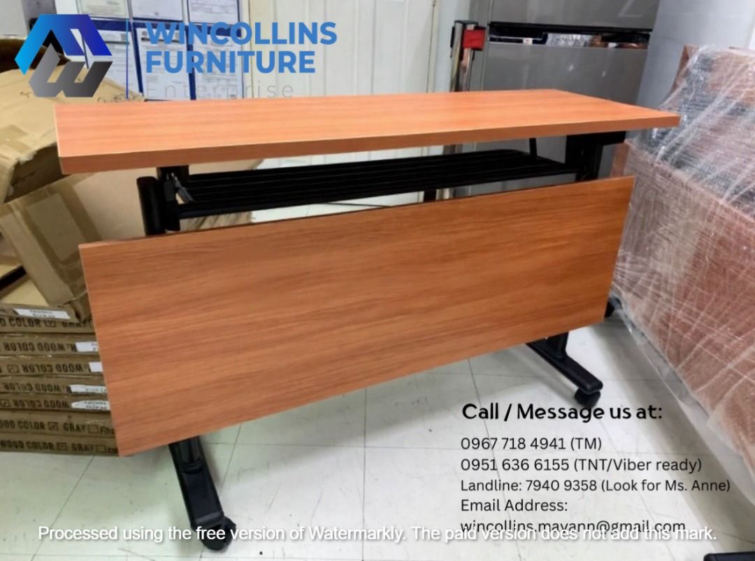 Folding Training Table / Study Table / Work Table (Category: Tables & Sets) located in Manila. Submitted by wincollinsmayannrc (Listing ID 1450939701, Image 1). Description: Folding Training Table / Office Table Melamine scratch proof table top and modesty With 2nd layer shelf Black Tubular legs with caster wheels Color: Off White.