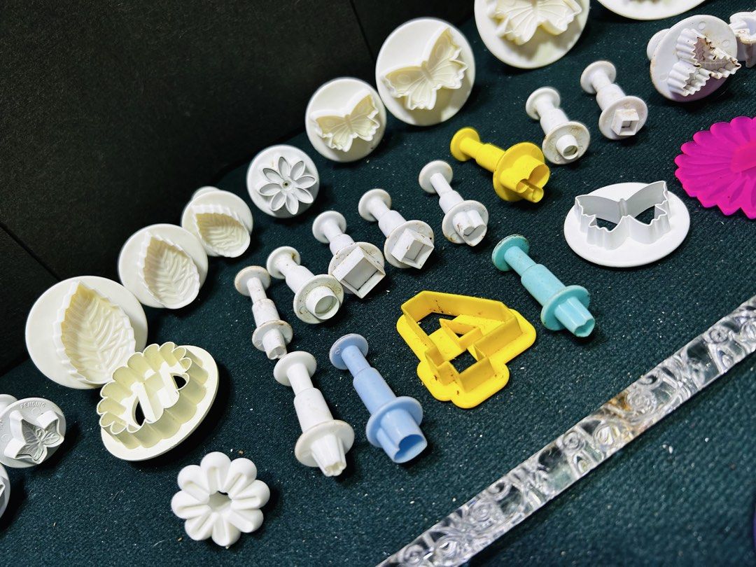 Fondant Cutters Molds Set for Cake Decorating (Category: Bakeware) located in Manila. Submitted by starbalesukandjapansurplus (Listing ID 1451129393, Image 3). Description: - Extensive fondant cutter and mold collection. - Features butterflies, leaves, flowers, and letters. - Includes a small rolling pin. - Comes with various round cutters. - Ideal for baking and cake decorating. - All items pictured are included. - Perfect for adding intricate d