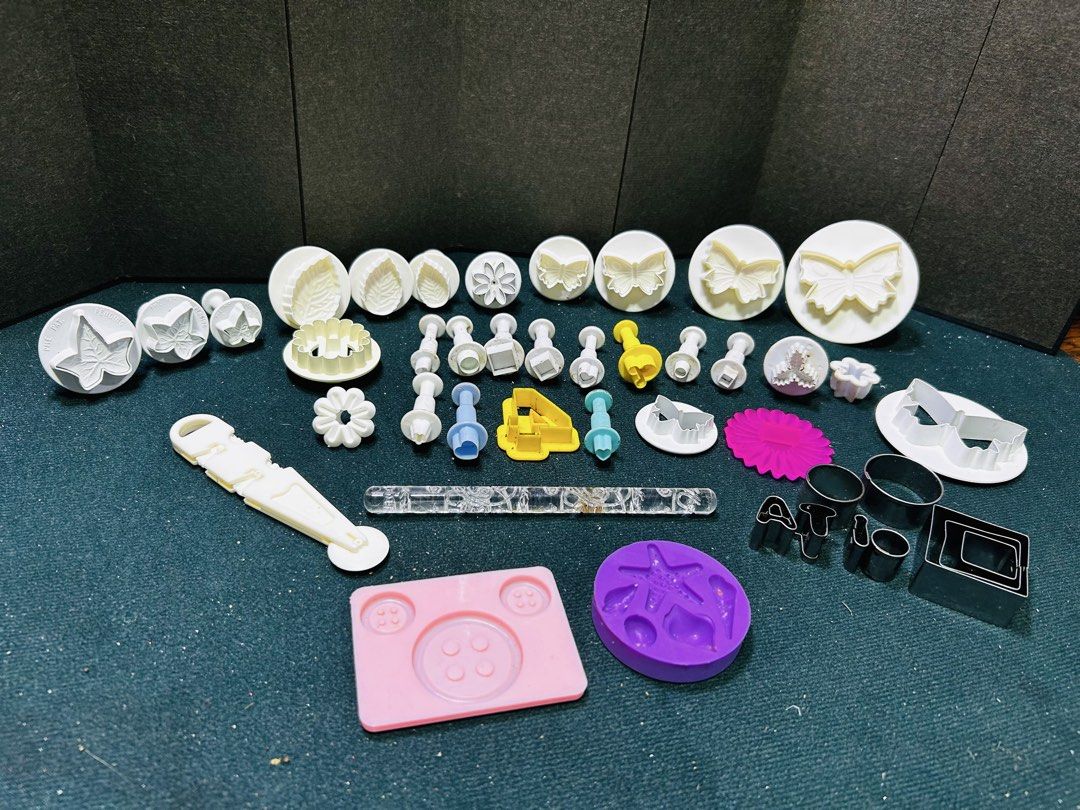 Fondant Cutters Molds Set for Cake Decorating (Category: Bakeware) located in Manila. Submitted by starbalesukandjapansurplus (Listing ID 1451129393, Image 1). Description: - Extensive fondant cutter and mold collection. - Features butterflies, leaves, flowers, and letters. - Includes a small rolling pin. - Comes with various round cutters. - Ideal for baking and cake decorating. - All items pictured are included. - Perfect for adding intricate d