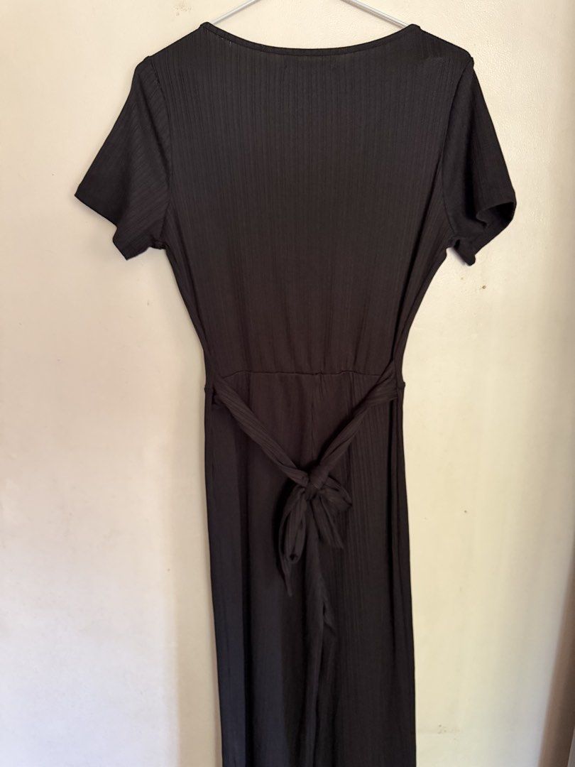 Forever 21 Black Ribbed Wrap Jumpsuit Size M (Category: Jumpsuits) located in Angeles City. Submitted by endzn (Listing ID 1451012867, Image 3). Description: - Black ribbed jumpsuit from Forever 21 - Short sleeves and V-neck wrap style - Wide leg pants - Comes with a tie belt - Perfect for dressing up or down - Comfortable and stylish.