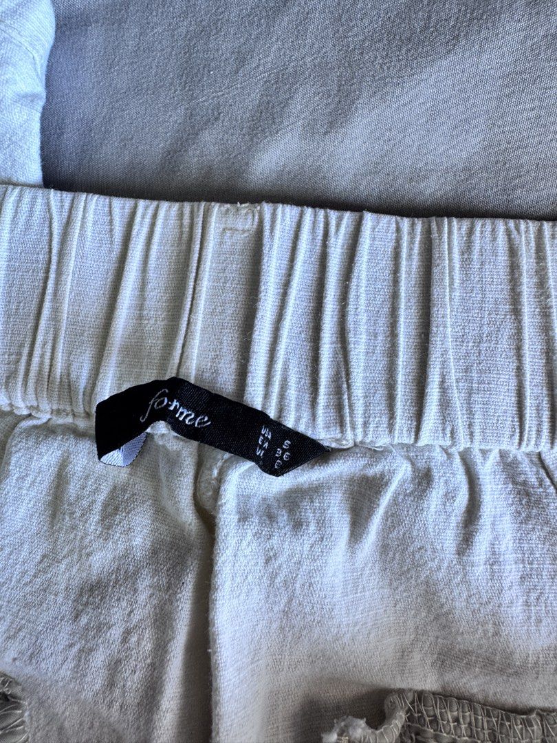 FORME White Linen Blend Wide Leg Pants Size S (Category: Other Bottoms) located in Pasay City. Submitted by idaboutique (Listing ID 1451065163, Image 2). Description: - FORME white pants - Linen blend fabric - Wide leg cut - Elastic waistband at the back - Small faint stain on the right leg (visible in the last photo).