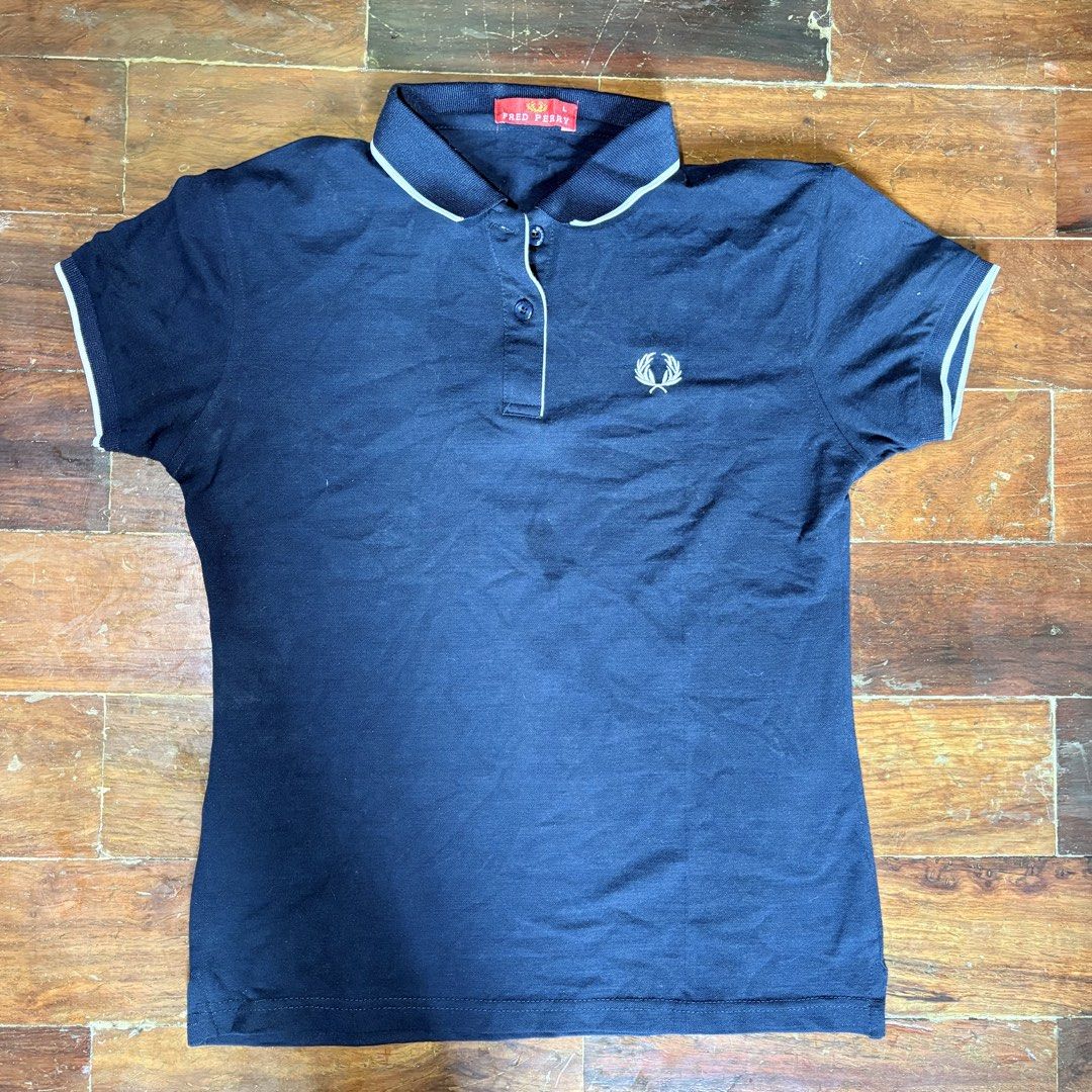 Fred Perry Navy Blue Polo Shirt (Category: Shirts) located in Mandaluyong City. Submitted by aestephics (Listing ID 1451006872, Image 1). Description: rfs need student funds! for inquiries, message anytime note: kindly manage your expectations for pre-loved items. loc: mandaluyong city near rtu mop gcash or maya shipping via lalamove, j&t, or angkas padala.