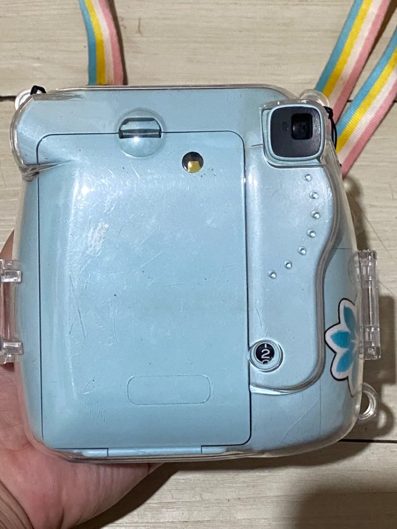 Fujifilm Instax Mini 8 Light Blue Instant Camera with Case (Category: Cameras) located in Caloocan City. Submitted by vastforest.a5fc8a (Listing ID 1451075164, Image 2). Description: - Light blue Fujifilm Instax Mini 8 camera - Comes with a clear protective case - Includes rainbow strap, battery - with 2 free films for testing - No issue! Maguupgrade lang so di na magagamit! .