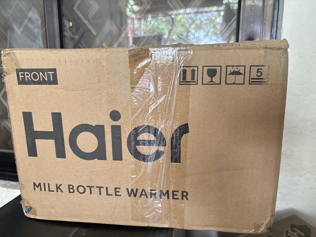 Haier Single Cup Milk Warmer HBW-S05W (Category: Breastfeeding & Bottle Feeding) located in Quezon City. Submitted by geebags (Listing ID 1450985192, Image 2). Description: Bnew never use - Haier Milk Bottle Warmer - Precise milk warming and nutrient restoration - Single cup capacity - Digital display shows temperature - Comes in original box - Ideal for keeping baby's milk at the perfect temperature.