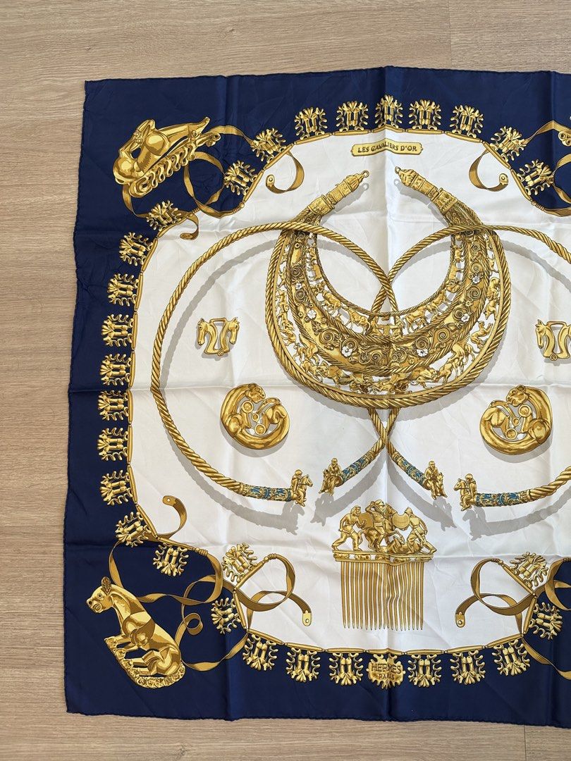 Hermes Silk Scarf “Les Cavaliers D’or by Rybaltchenko (Category: Scarves) located in Kuala Lumpur. Submitted by bestofferbundle (Listing ID 1450942881, Image 3). Description: Hermès Carré 90 – Les Cavaliers d’Or by Vladimir Rybaltchenko Hermès silk scarf Les Cavaliers d’Or rekaan Vladimir Rybaltchenko. ✔️ 100% Silk ✔️ Made in France ✔️ Saiz 90 × 90 cm ✔️ Condition cantik, sila refer gambar. Design bertemakan penunggang kuda dengan sentuhan klasik