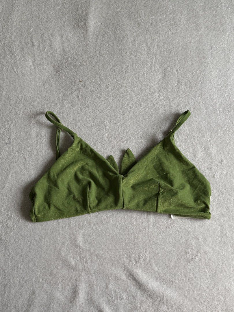 H&M Green Metallic Bikini Top (Category: Bikinis & Swimsuits) located in Quezon City. Submitted by thecurvycorner (Listing ID 1450977404, Image 1). Description: - Brand: H&M - Color: Green - Size: 12 - Material: Metallic sheen fabric - Closure: Tie-back - Features: Adjustable straps .
