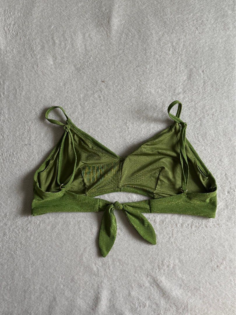 H&M Green Metallic Bikini Top (Category: Bikinis & Swimsuits) located in Quezon City. Submitted by thecurvycorner (Listing ID 1450977404, Image 2). Description: - Brand: H&M - Color: Green - Size: 12 - Material: Metallic sheen fabric - Closure: Tie-back - Features: Adjustable straps .