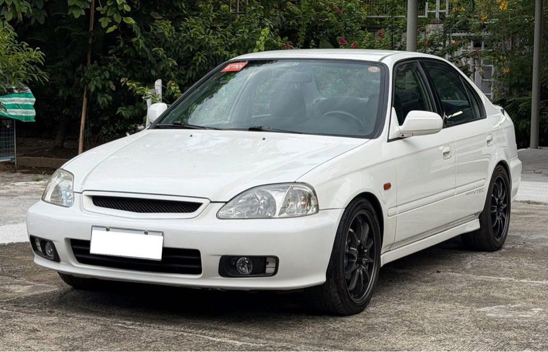 Honda Civic SIR Manual (Category: Used Cars) located in Manila. Submitted by quality_cars (Listing ID 1451059304, Image 2). Description: Eto na ang pang Car Guy nyo mga Boss “ 90’s Car Never Die “ Honda Civic SIR 1999 M/T Loaded -Preserve and orig paint (fresh condition) - Kanzai 3 row Aluminum radiator -Samco hose (blue) -FIC brand injectors -Type R cams -Type R valves -Type R valve spring retainers -Golden eagle cam gears -Blue Gates T belt -Co