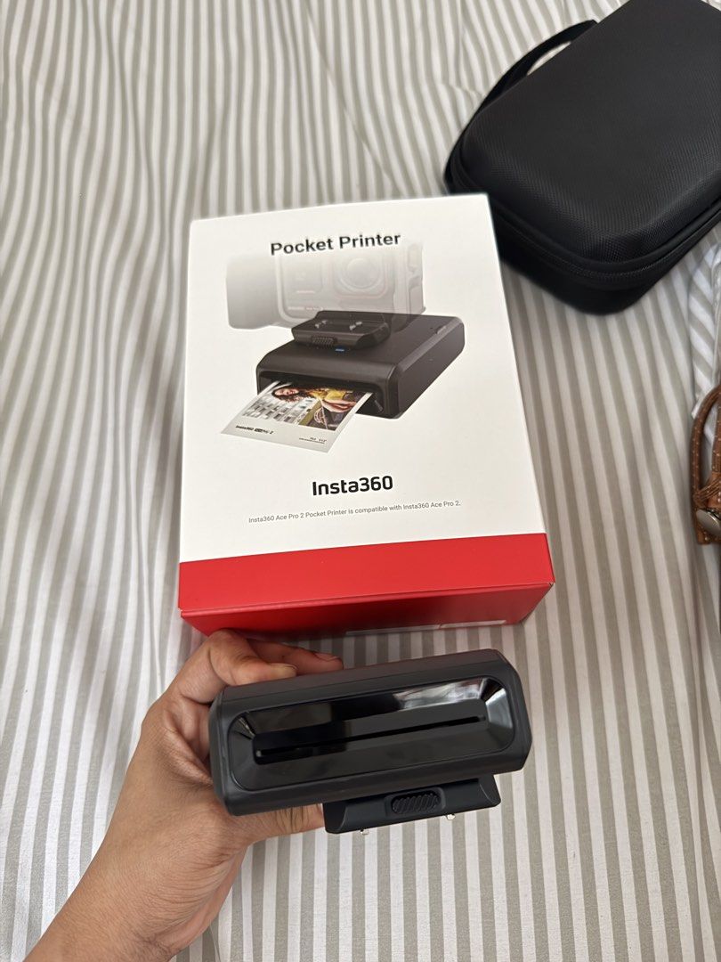 Insta360 Pocket Printer for Insta360 Ace Pro 2 (Category: Cameras) located in Manila. Submitted by kitty88888888 (Listing ID 1451012110, Image 3). Description: For Sale! Insta 360 Ace pro 2 pocket printer May 8pcs pa photo paper. - Insta360 Pocket Printer - Compatible with Insta360 Ace Pro 2 and Insta360 Ace Pro - Includes printer unit, battery, and charging adapter - Original box included - Ideal for on-the-go photo printing.