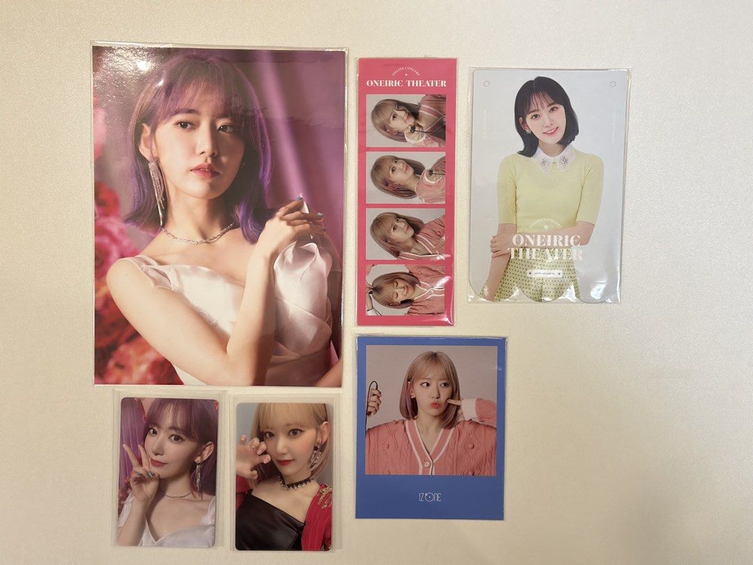 IZONE Sakura Oneiric Theater Photocards & Posters (Category: K-Wave Merchandise) located in Pasig City. Submitted by ddincart (Listing ID 1450936758, Image 1). Description: - Includes: Large Poscard, Photo Strip, Ticket, 2 Individual Photocards.