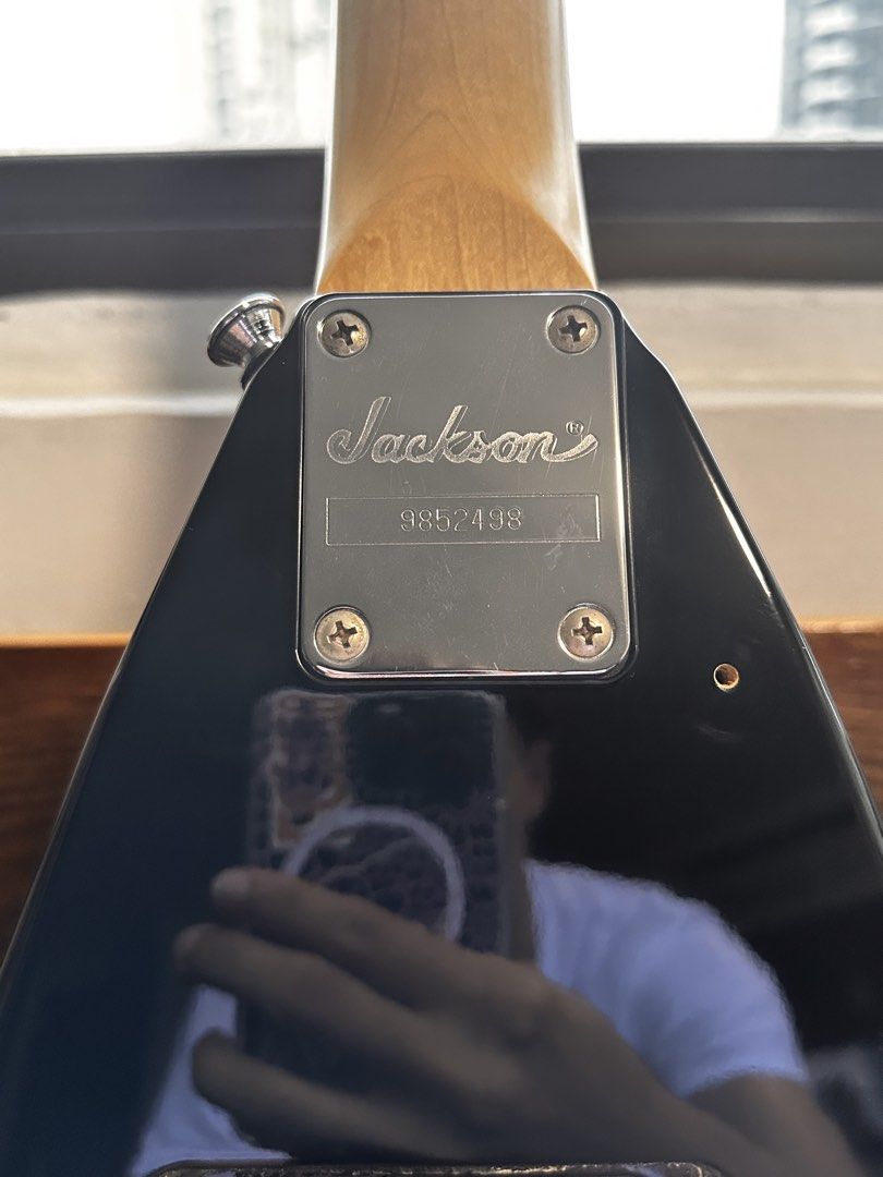 Jackson King V MIJ (Category: Musical Instruments) located in Singapore. Submitted by digsno (Listing ID 1451037708, Image 7). Description: King V Jackson KVX10 (Up to nego but no lowball) Everything in good condition aside from the small dents in the body, and paint chips on the bottom edges and the chip in the headstock. Comes with soft case as well, has a small hole in the top of the case which needs to be sewn. Neck feels brand new, fret life