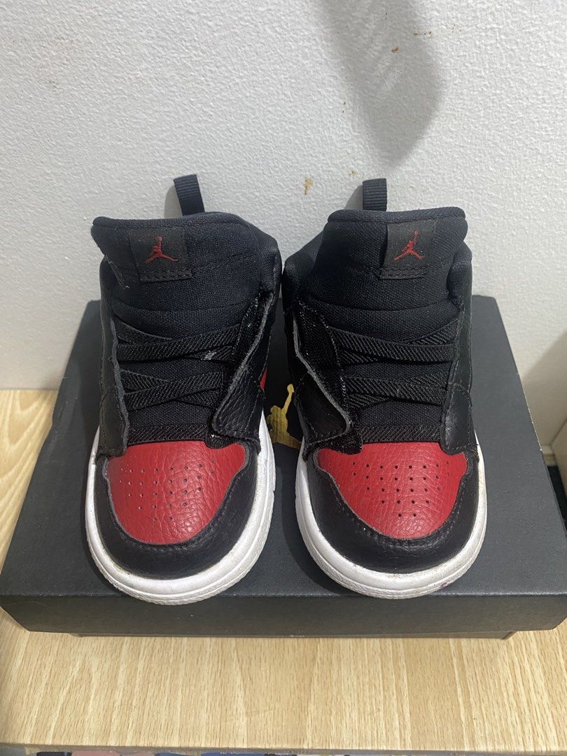 Jordan 1 Toddler Shoes Size 7C (Category: Babies & Kids Fashion) located in Cavite. Submitted by laliswagg (Listing ID 1451070561, Image 1). Description: - Toddler Jordan 1 Shoes - Color: Black and Red - Size: 7C - Includes Original Box - Ideal for toddlers learning to walk or run - Easy to put on and take off.