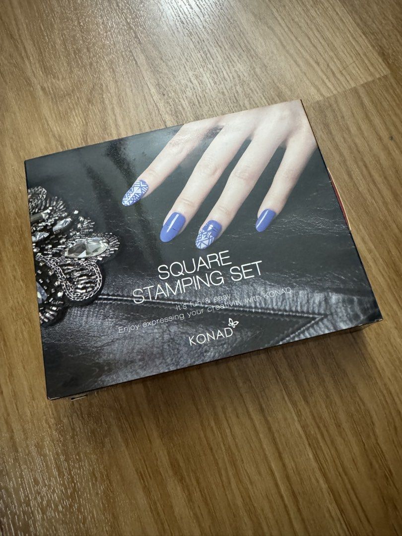 Konad Square Stamping Set Nail Art Kit (Category: Hands & Nails) located in Manila. Submitted by plbranded202627 (Listing ID 1451015404, Image 1). Description: - Easy nail art creation with Konad Square Stamping Set - Includes stamper, scraper, and image plate with various designs - Perfect for DIY manicures - Fun and simple to use - Make your nails stand out!.