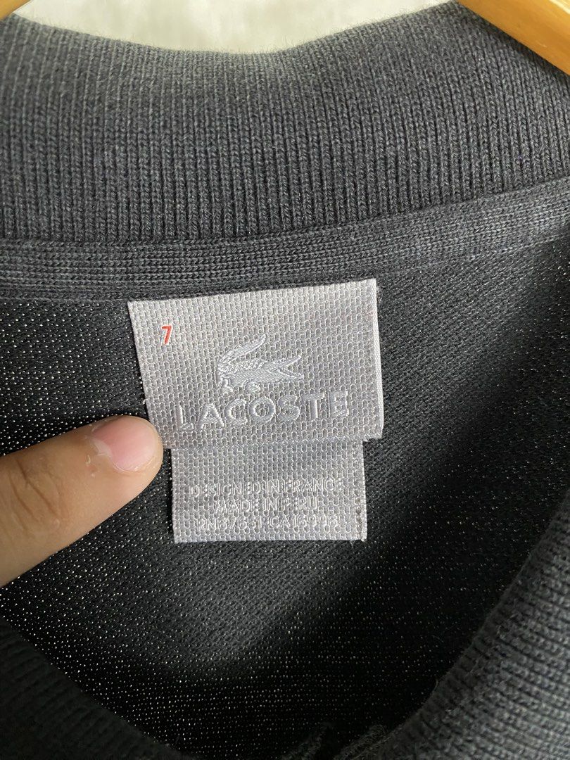 Lacoste Polo Shirt (Category: Tshirts & Polo Shirts ) located in Cabanatuan. Submitted by luwer (Listing ID 1451093650, Image 3). Description: Lacoste Black Polo Shirt size 7 in good condition cr 9.