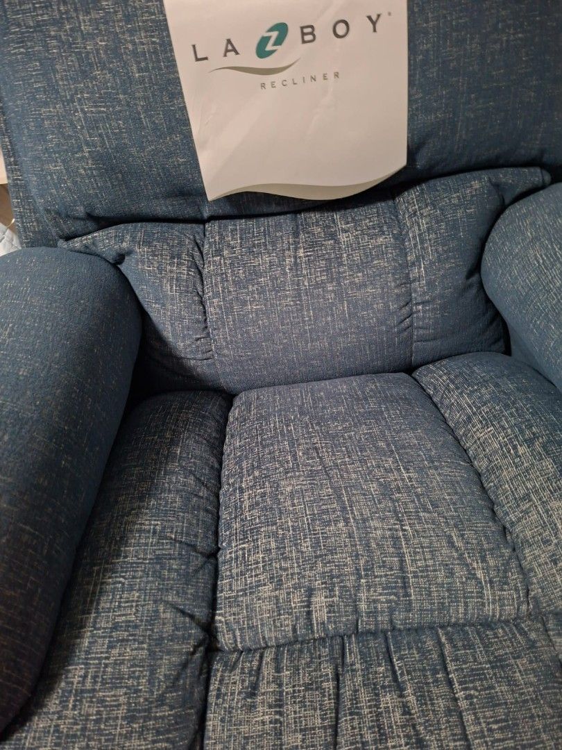 La-Z-Boy Recliner - Blue Fabric (Category: Chairs) located in Taguig. Submitted by kitin1218 (Listing ID 1451040087, Image 3). Description: - Comfortable La-Z-Boy recliner - Nice blue textured fabric - Padded arms and back for extra comfort - Smooth reclining mechanism - Perfect for relaxing after a long day - Fits well in most living rooms - Selling because it's no longer needed -Seldome used 📍Taguig.