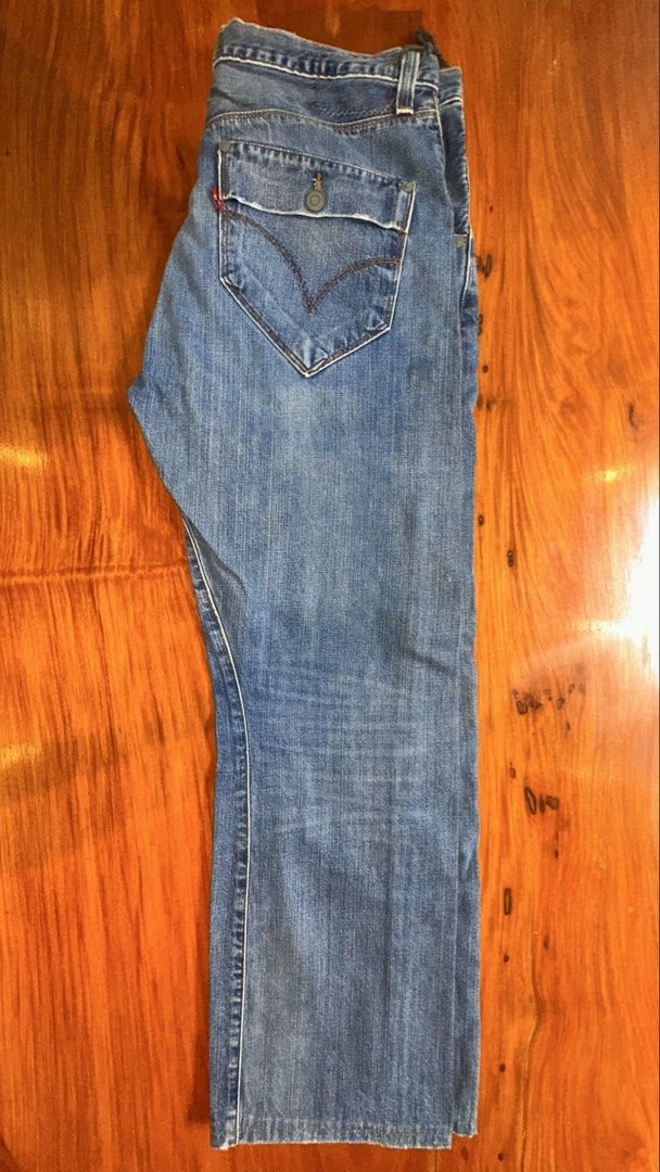Levi's Engineered Demin Jeans (Category: Jeans) located in Paranaque City. Submitted by edwintatel (Listing ID 1450960045, Image 3). Description: - Classic Levi's blue denim jeans - Straight leg fit - Button fly closure - Two back pockets with button closure - Noticeable fading on front legs - Perfect for everyday wear.