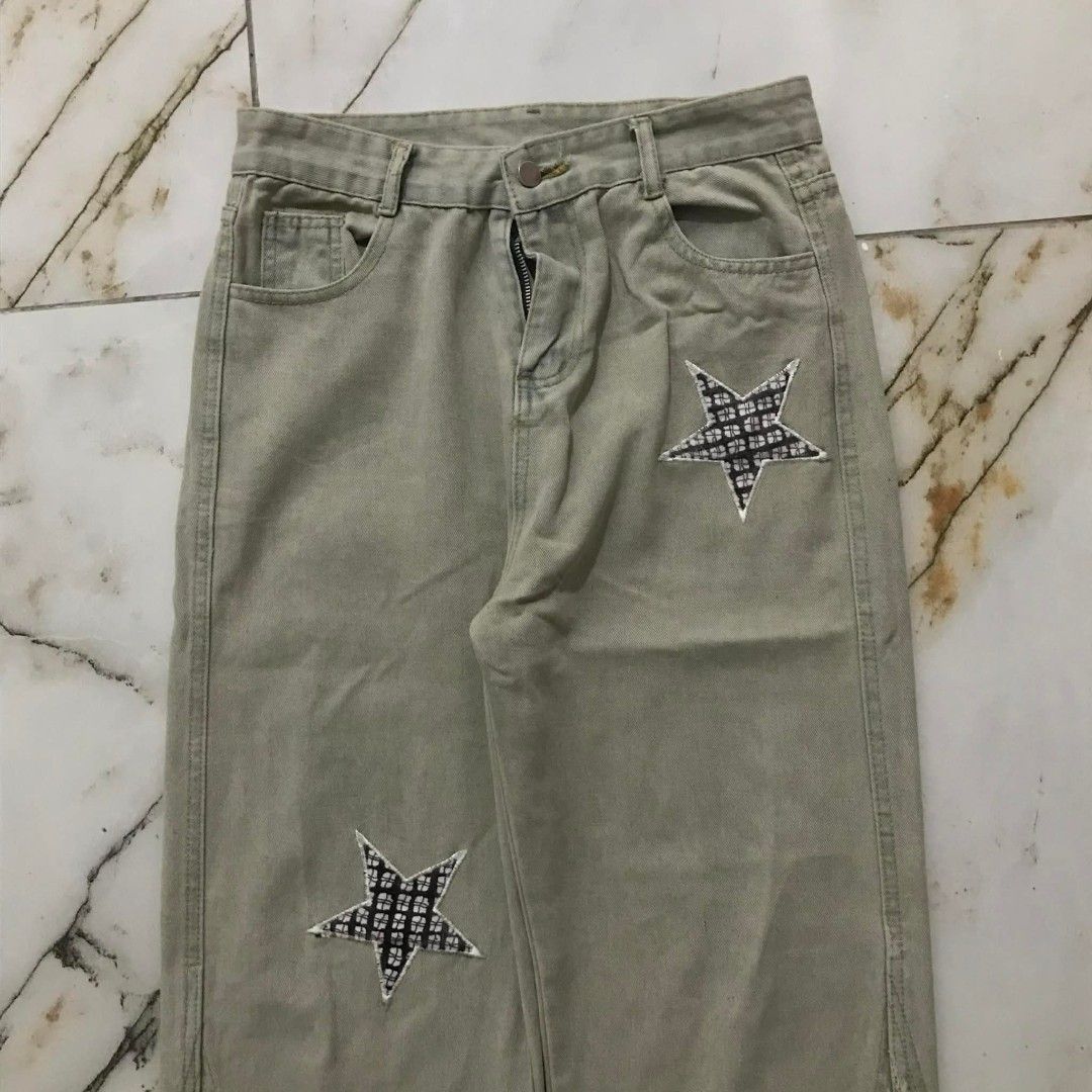 Light Wash Jeans with Star Patches (Category: Jeans) located in Manila. Submitted by its_d4ve (Listing ID 1450995360, Image 2). Description: - Light wash denim jeans - Straight leg fit - All-over star patches - Distressed details on legs - Button and zip closure - Front and back pockets - Ideal for a casual look - size 29.