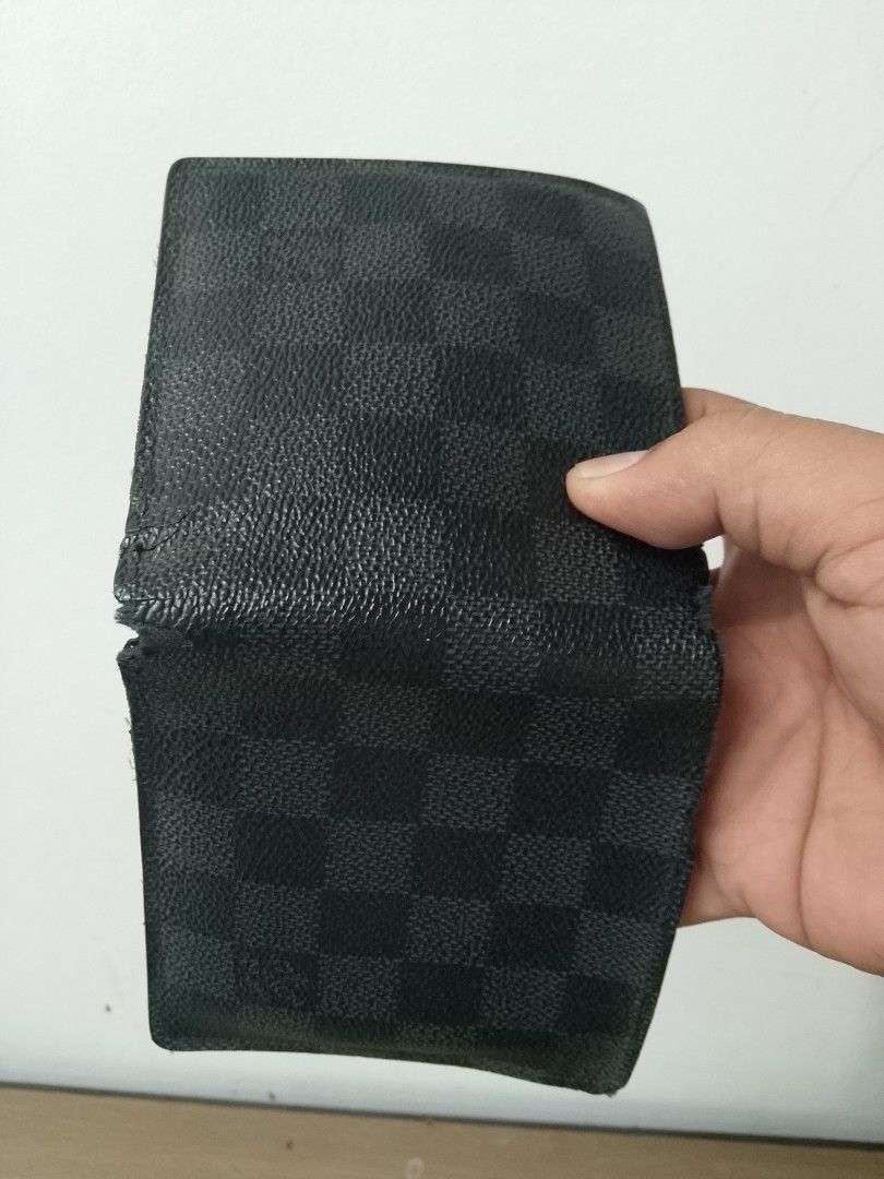 Louis Vuitton Damier Graphite Bifold Wallet (Category: Luxury Bags & Wallets) located in Pasay City. Submitted by gcia86 (Listing ID 1450999691, Image 2). Description: - WELL USED - PRICE IS VERY NEGOTIABLE - Authentic Louis Vuitton Wallet - Damier Graphite Canvas - Bifold Design - Multiple Card Slots & Bill Compartments - Fully functional and stylish - Ideal for everyday carry .
