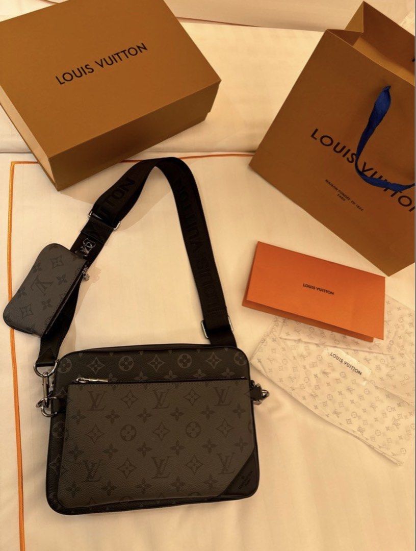 Louis Vuitton Trio Messenger Bag (Monogram Eclipse) (Category: Luxury Bags & Wallets) located in Quezon City. Submitted by law.1789 (Listing ID 1451102982, Image 1). Description: Louis Vuitton Trio Messenger Bag (Microchipped) Inclusions: Bag, Box, Dust Bag, and Paper Bag * Bought from a seller here on Carousell. * Used only a couple of times. * NFC chip scans successfully, and the scan details change with each scan. (Signs of authenticity) Sligh