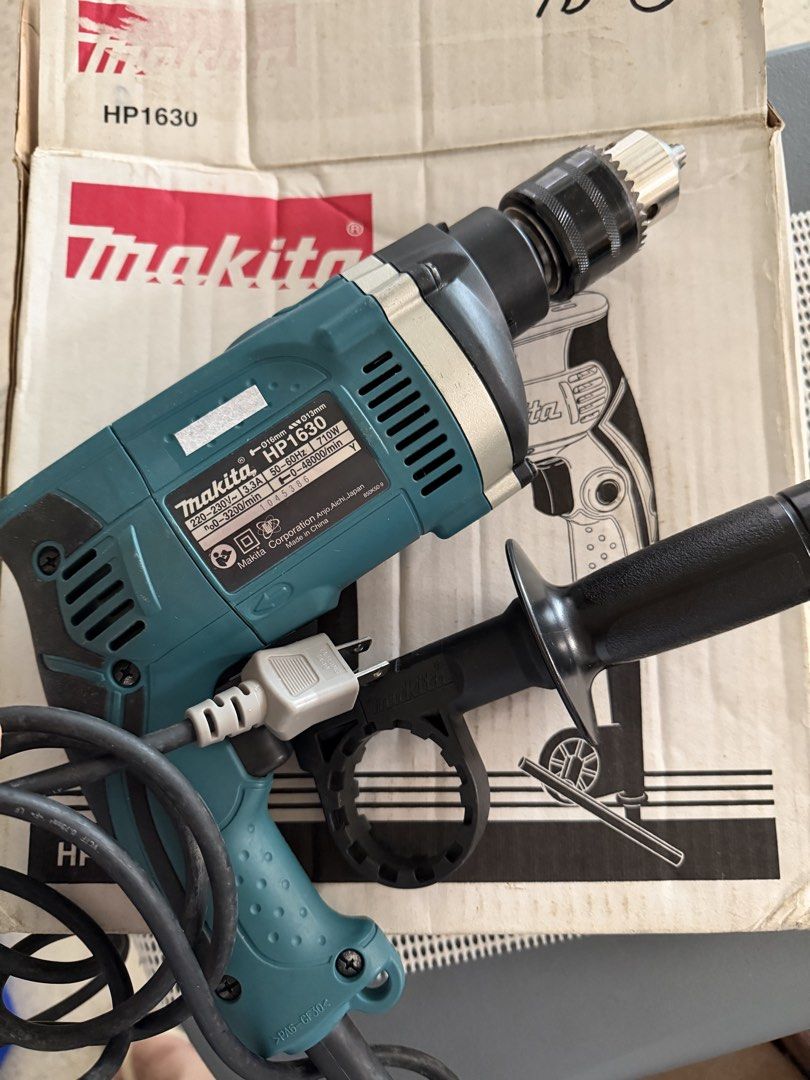Makita Hammer Drill 16mm (Category: Construction Tools & Equipment) located in Manila. Submitted by danipoli (Listing ID 1450967051, Image 2). Description: Original Makita Hammer Drill Electric drill 16mm HIGHLIGHTS: High power 710W motor Ergonomically designed handle with rubberized soft grip Sturdy cylinder-shaped motor housing. Built-in, shock-proof, high-output Ball bearing construction for longer tool life Rubberized comfort grip for more co