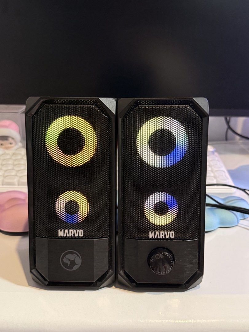 MARVO RGB Computer Speakers with Volume Knob (Category: Soundbars, Speakers & Amplifiers) located in Quezon City. Submitted by deporky (Listing ID 1451068566, Image 2). Description: - MARVO Computer Speakers - Vibrant RGB lighting that cycles through colors - Convenient front-facing volume knob - Ideal for gaming and music listening - Tested and confirmed working - All necessary cables included.