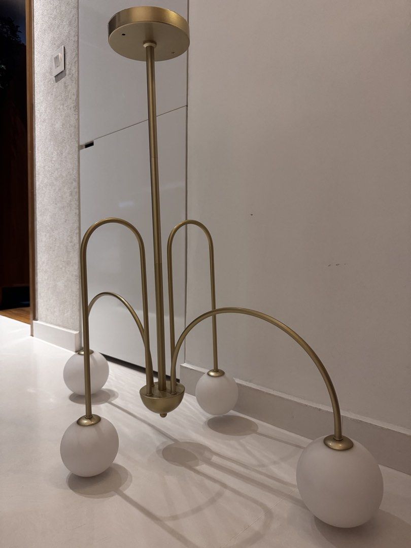 Modern Gold Chandelier with Frosted Glass Globes