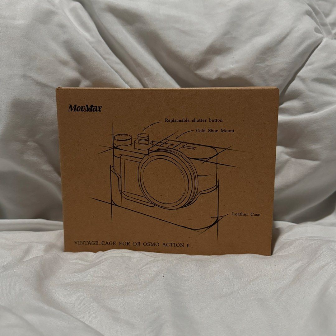 Movmax Vintage Cage (DJI Osmo Action 6) (Category: Camera Bags & Carriers) located in San Juan City. Submitted by white.sells (Listing ID 1450961101, Image 1). Description: Movmax Vintage Cage (DJI Osmo Action 6) PRICE: 4,590 INFORMATION * Bought recently (July 14, 2026) * Bought for ₱5,990 in Henry’s GH Mall * No scratches, like brand new * Makes your camera look like a cool vintage cam * ONLY FOR: DJI Action 6 INCLUSIONS * Box * Tin can (w/cage