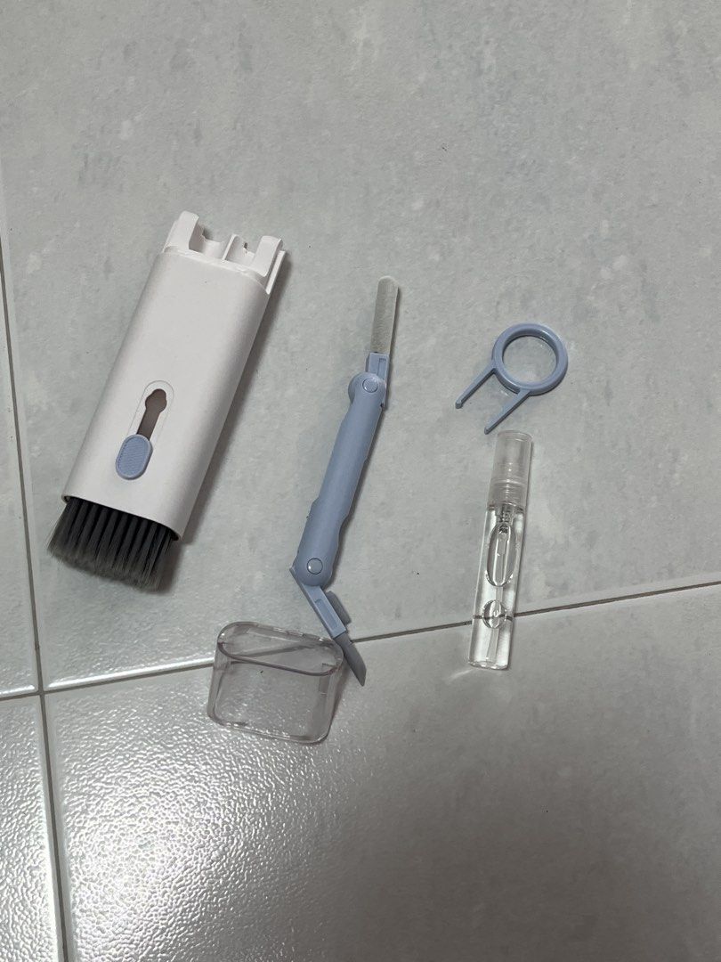 Multi-function Cleaning Kit for Electronics (Category: Cleaning Tools & Supplies) located in Singapore. Submitted by dontucomehere (Listing ID 1451023624, Image 1). Description: - Handy cleaning kit for keyboards and earbuds. - Comes with a brush. - Features a cleaning pen with metal tip and brush. - Includes a keycap puller. - Small spray bottle included. - All parts fit neatly into the main unit..