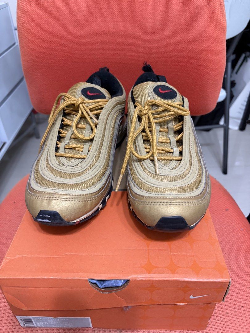 Nike Air Max 97 Metallic Gold (Category: Sneakers) located in Manila. Submitted by joean21 (Listing ID 1451055934, Image 2). Description: - Gold Nike Air Max 97 - Goes for around $120 used on ebay.