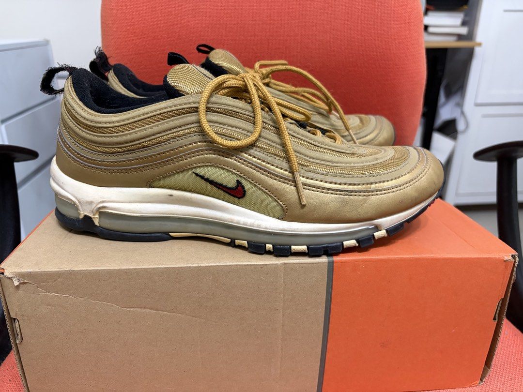 Nike Air Max 97 Metallic Gold (Category: Sneakers) located in Manila. Submitted by joean21 (Listing ID 1451055934, Image 3). Description: - Gold Nike Air Max 97 - Goes for around $120 used on ebay.