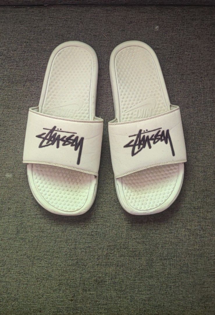 Nike Benassi Stussy Cream Slides (Category: Slippers & Slides) located in Bago City. Submitted by louielinco (Listing ID 1450936404, Image 2). Description: - Cream Nike Benassi Slides - Stussy Collaboration - Size: US 10 - Colorway: Sail/Black - Model: DCS239-100 - Ideal for casual wear.