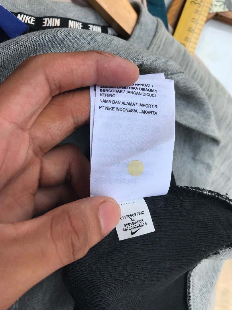 Nike Grey Crewneck Sweatshirt XL (Category: Coats, Jackets and Outerwear) located in Manila. Submitted by rhynh4rt (Listing ID 1450962045, Image 3). Description: - Grey Nike sweatshirt - Large white Nike logo on front - Raglan sleeves - Tag size: XL - Made in China - Approx. 23 inches chest measurement.