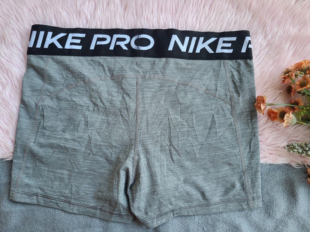 Nike Pro Grey Dri-FIT Compression Shorts (Category: Activewear) located in Lingayen. Submitted by chloeswhite (Listing ID 1451023775, Image 2). Description: - Grey Nike Pro shorts - Made with Dri-FIT material for optimal performance - Ideal for running, gym, and training sessions - Features a comfortable elastic waistband with "NIKE PRO" branding - Includes a small Nike swoosh logo on the leg - Offers a comfortable and supportive fit -Waistline 2