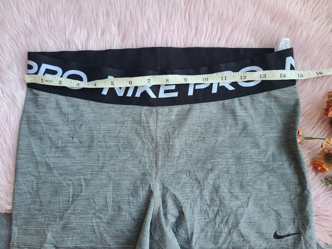 Nike Pro Grey Dri-FIT Compression Shorts (Category: Activewear) located in Lingayen. Submitted by chloeswhite (Listing ID 1451023775, Image 3). Description: - Grey Nike Pro shorts - Made with Dri-FIT material for optimal performance - Ideal for running, gym, and training sessions - Features a comfortable elastic waistband with "NIKE PRO" branding - Includes a small Nike swoosh logo on the leg - Offers a comfortable and supportive fit -Waistline 2